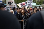 Trump, President Trump, chicago citizens stand united against trump following his first visit, Downtown