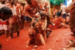 la tomatina 2018, la tomatina tickets, la tomatina 2019 thousands hurl fruit at fun food festival, Burial