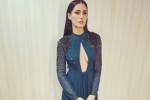 Nargis Fakhri navel show, Nargis Fakhri hot in green, nargis fakhri asked to pin up her dress, Uday chopra