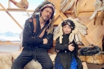 Shah Rukh Khan trolled, Shah Rukh Khan son, shah rukh khan and his son abram trolled for sporting native american war bonnets, Abram