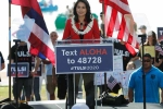 tulsi gabbard surfing, tulsi gabbard twitter, tulsi gabbard officially launches 2020 presidential campaign, 2020 us presidential campaign