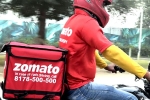 Zomato latest updates, Zomato share value, zomato has half its net loss, Zomato