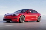 Tesla new electric car breaking news, Tesla new electric car videos, tesla to launch electric hatchback without a steering wheel, Sedan